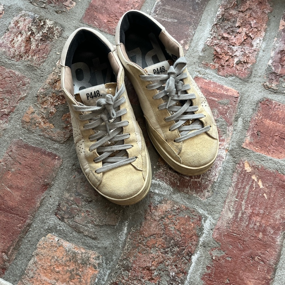 P448 white and yellowed sneaker
